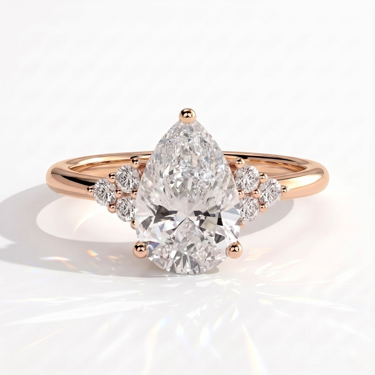 Pear lab-grown diamond halo engagement ring in 14K (585) rose gold, front view 