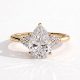 Pear lab-grown diamond halo engagement ring in 14K (585) yellow gold, front view 