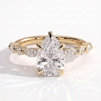 Pear lab-grown diamond halo engagement ring in 14K (585) yellow gold, front view 