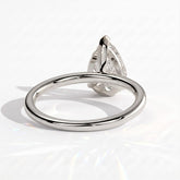 Pear lab-grown diamond solitaire engagement ring in 14K (585) white gold, on white background 