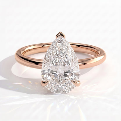 Pear lab-grown diamond solitaire engagement ring in 14K (585) rose gold, front view 