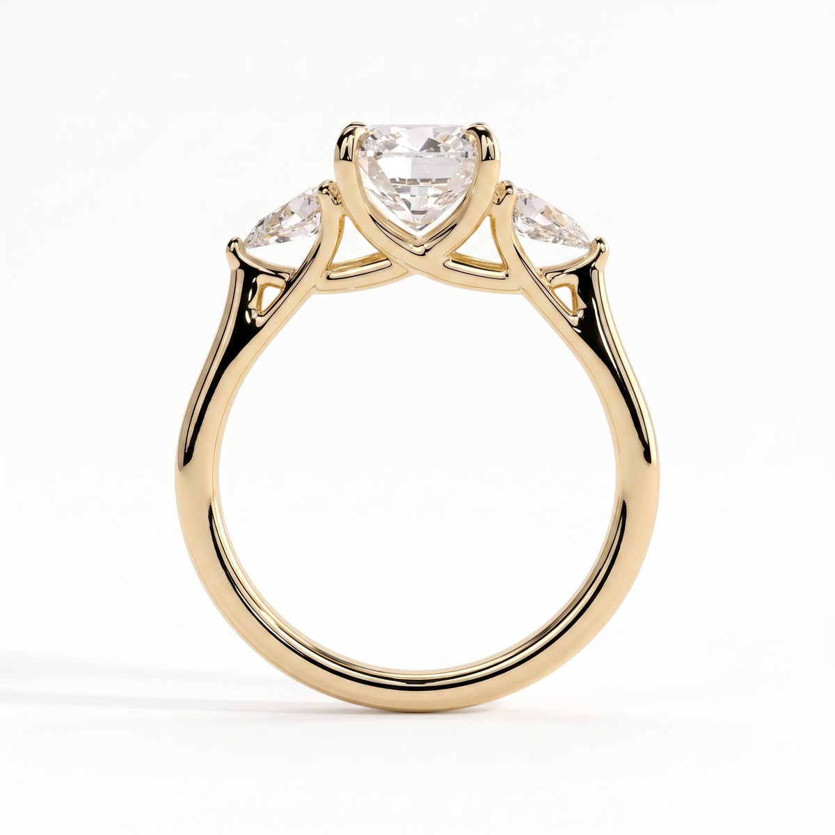 Cushion lab-grown diamond three-stone engagement ring in 14K (585) yellow gold, side profile 