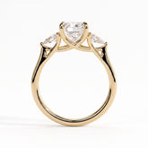 Cushion lab-grown diamond three-stone engagement ring in 14K (585) yellow gold, side profile 