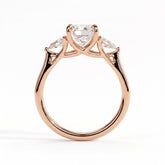 Cushion lab-grown diamond three-stone engagement ring in 14K (585) rose gold, side profile 