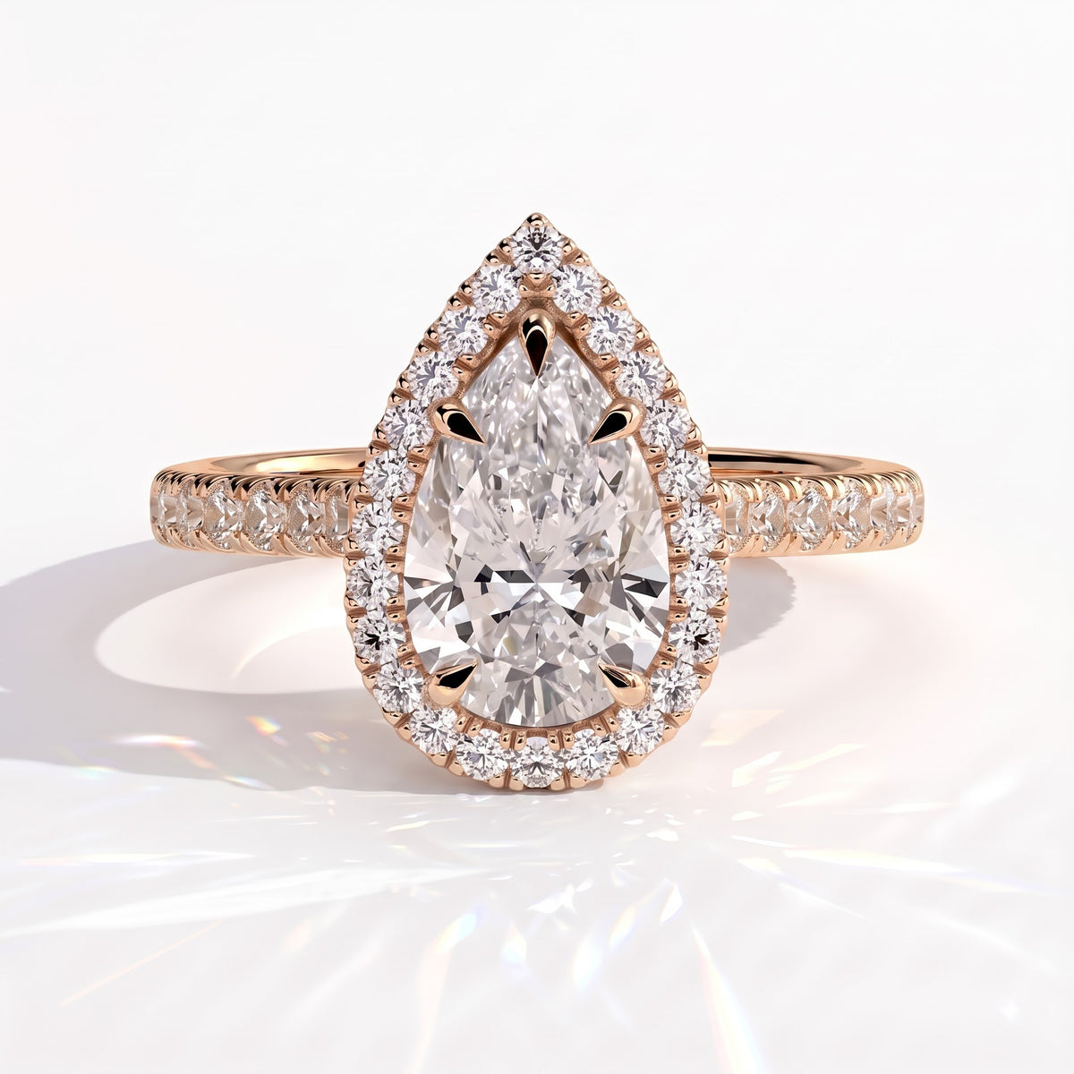 Pear lab-grown diamond halo engagement ring in 18K (750) rose gold, front view 