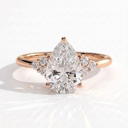 Pear lab-grown diamond halo engagement ring in 18K (750) rose gold, front view 