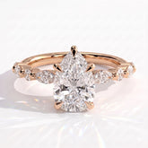 Pear lab-grown diamond halo engagement ring in 18K (750) rose gold, front view 