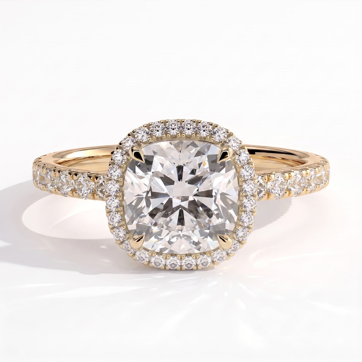 Cushion lab-grown diamond halo engagement ring in 18K (750) yellow gold, front view 