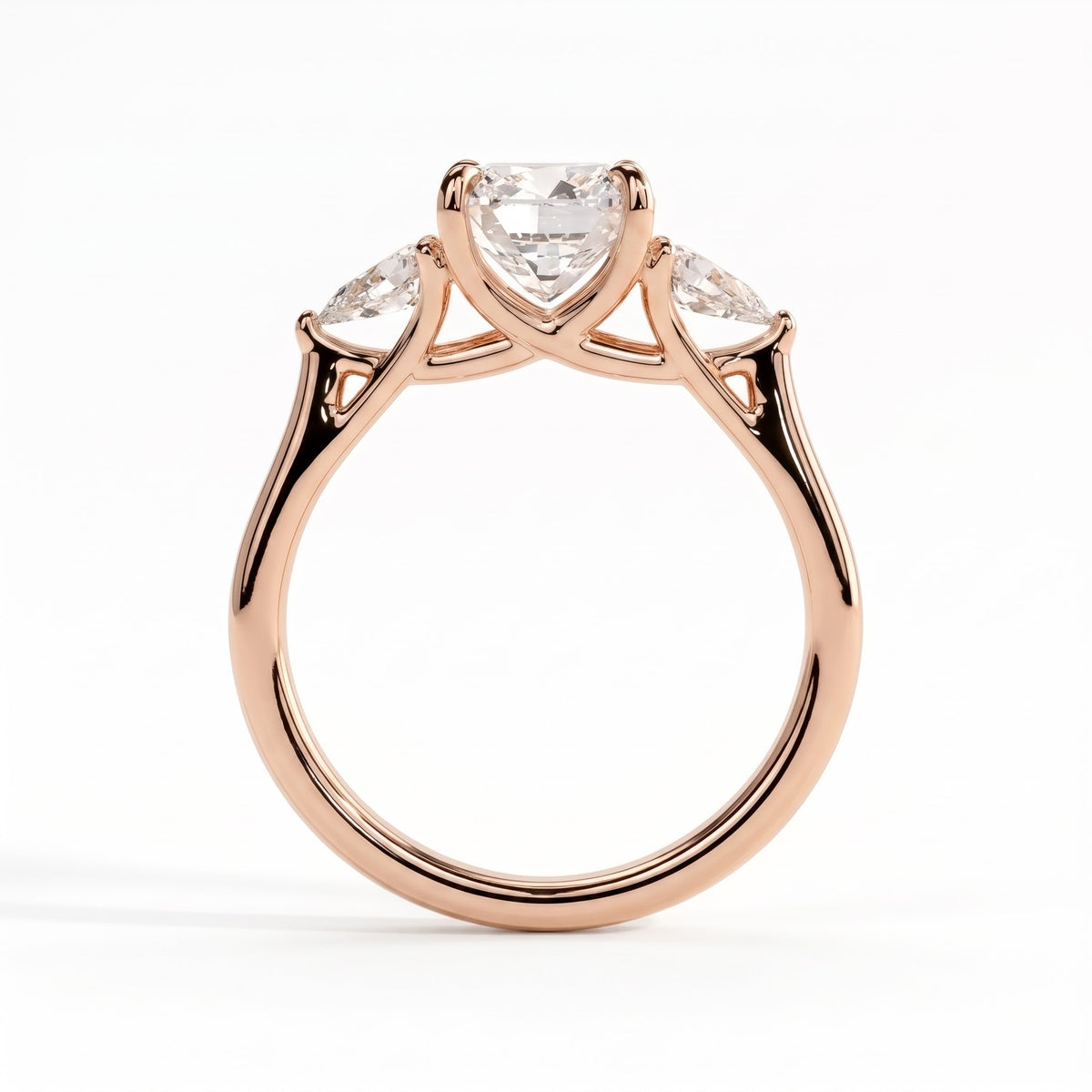 Cushion lab-grown diamond three-stone engagement ring in 18K (750) rose gold, side profile 