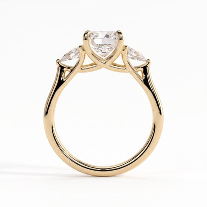 Cushion lab-grown diamond three-stone engagement ring in 18K (750) yellow gold, side profile 