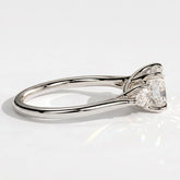 Cushion lab-grown diamond three-stone engagement ring in 18K (750) white gold, detail view 
