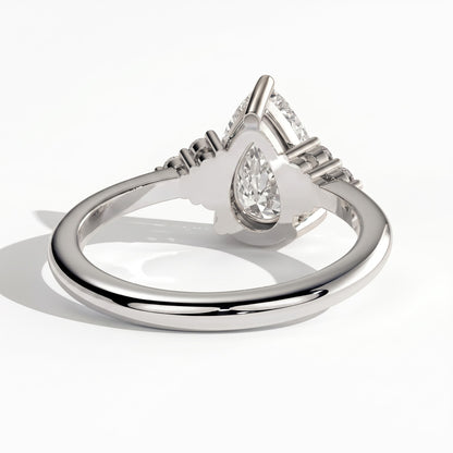 Pear lab-grown diamond halo engagement ring in 950 platinum, on white background 