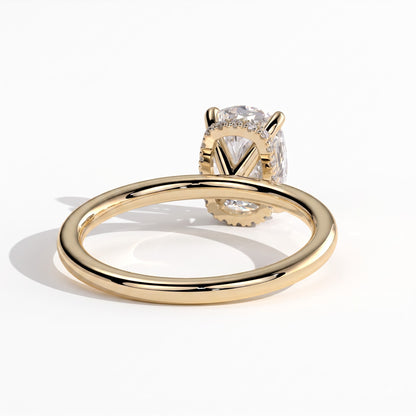 Elongated Cushion lab-grown diamond solitaire engagement ring in 14K (585) yellow gold, on white background 