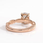 Elongated Cushion lab-grown diamond halo engagement ring in 14K (585) rose gold, on white background 