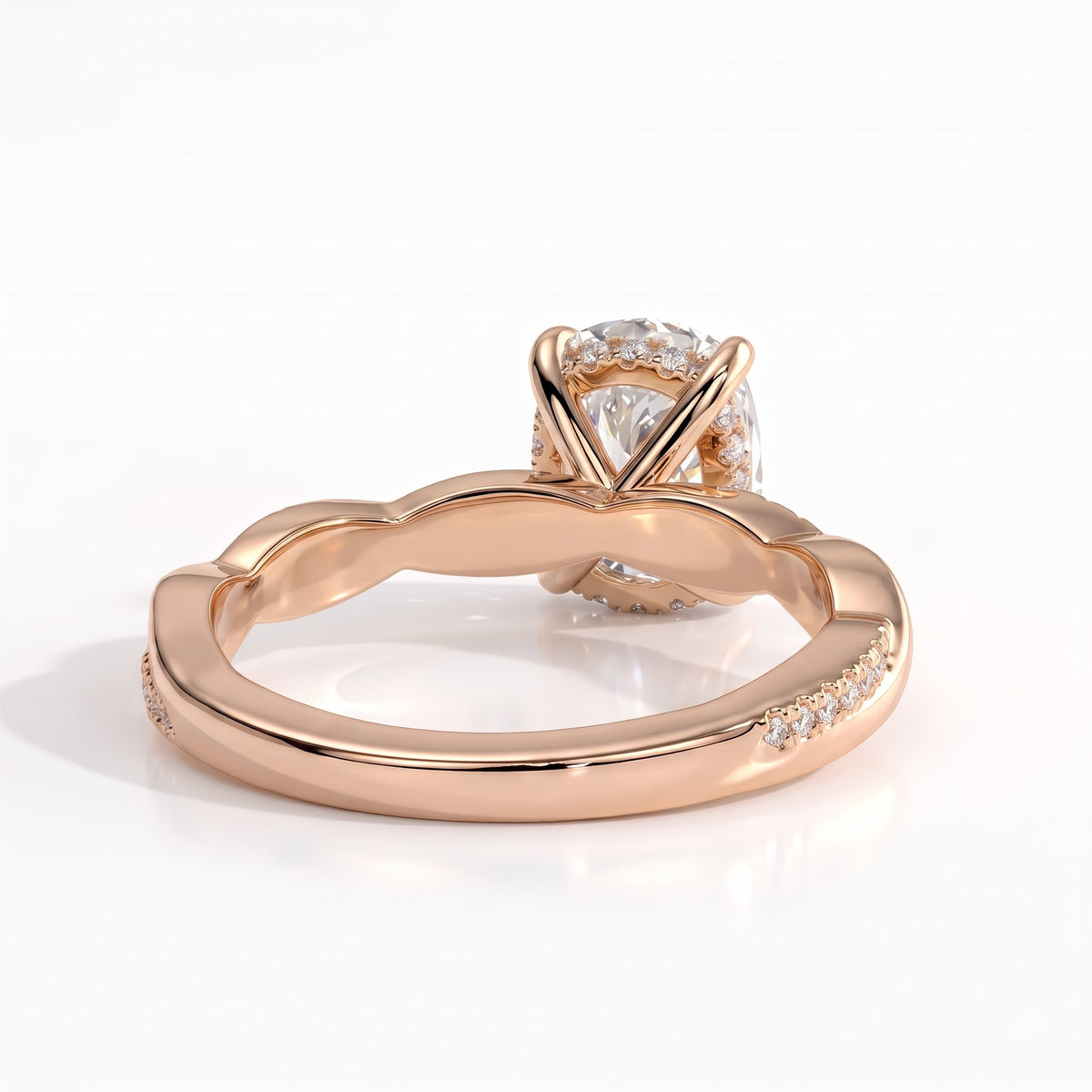 Elongated Cushion lab-grown diamond halo engagement ring in 14K (585) rose gold, on white background 