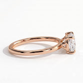 Elongated Cushion lab-grown diamond east-west solitaire engagement ring in 14K (585) rose gold, on white background 
