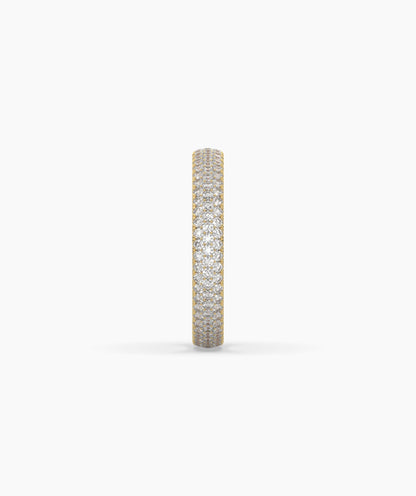 Celine round lab-grown diamond pavé eternity ring in 750 yellow gold, side profile view 