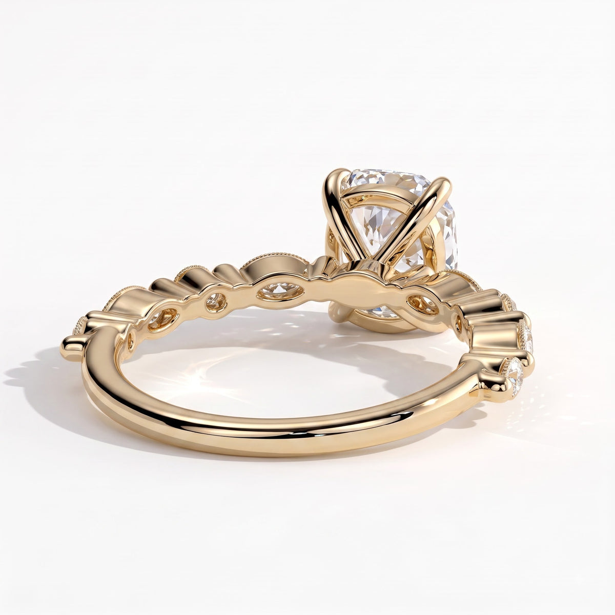 Elongated Cushion lab-grown diamond halo engagement ring in 18K (750) yellow gold, on white background 