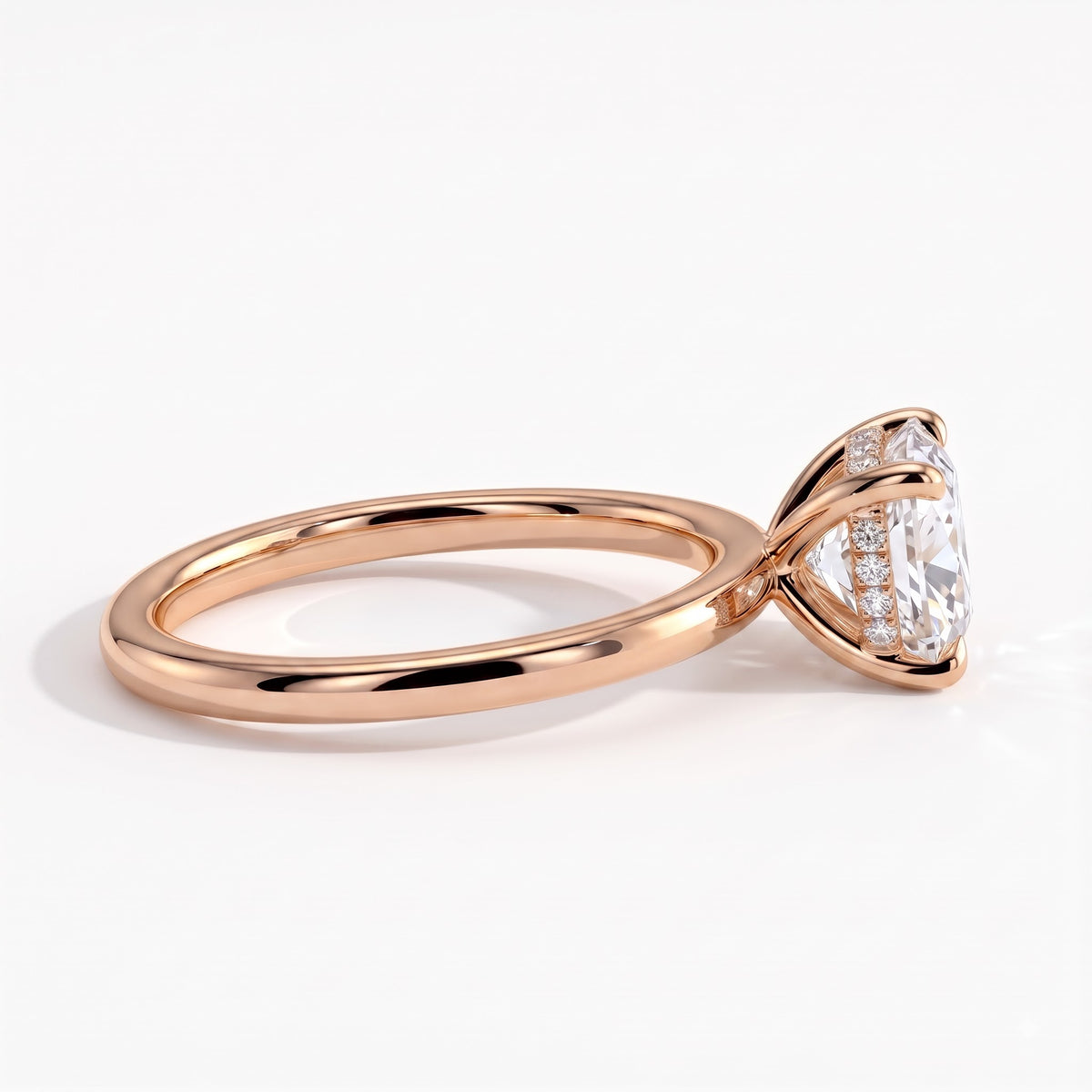 Cushion lab-grown diamond solitaire engagement ring in 18K (750) rose gold, side profile 