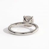Cushion lab-grown diamond solitaire engagement ring in 950 platinum, on white background 