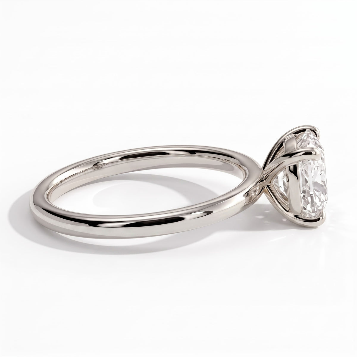 Elongated Cushion lab-grown diamond east-west solitaire engagement ring in 18K (750) white gold, detail view 
