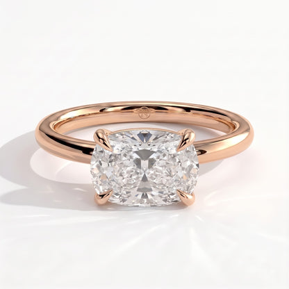 Elongated Cushion lab-grown diamond east-west solitaire engagement ring in 18K (750) rose gold, front view 
