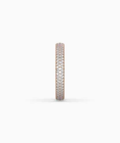 Celine round lab-grown diamond pavé eternity ring in 750 rose gold, side profile view 