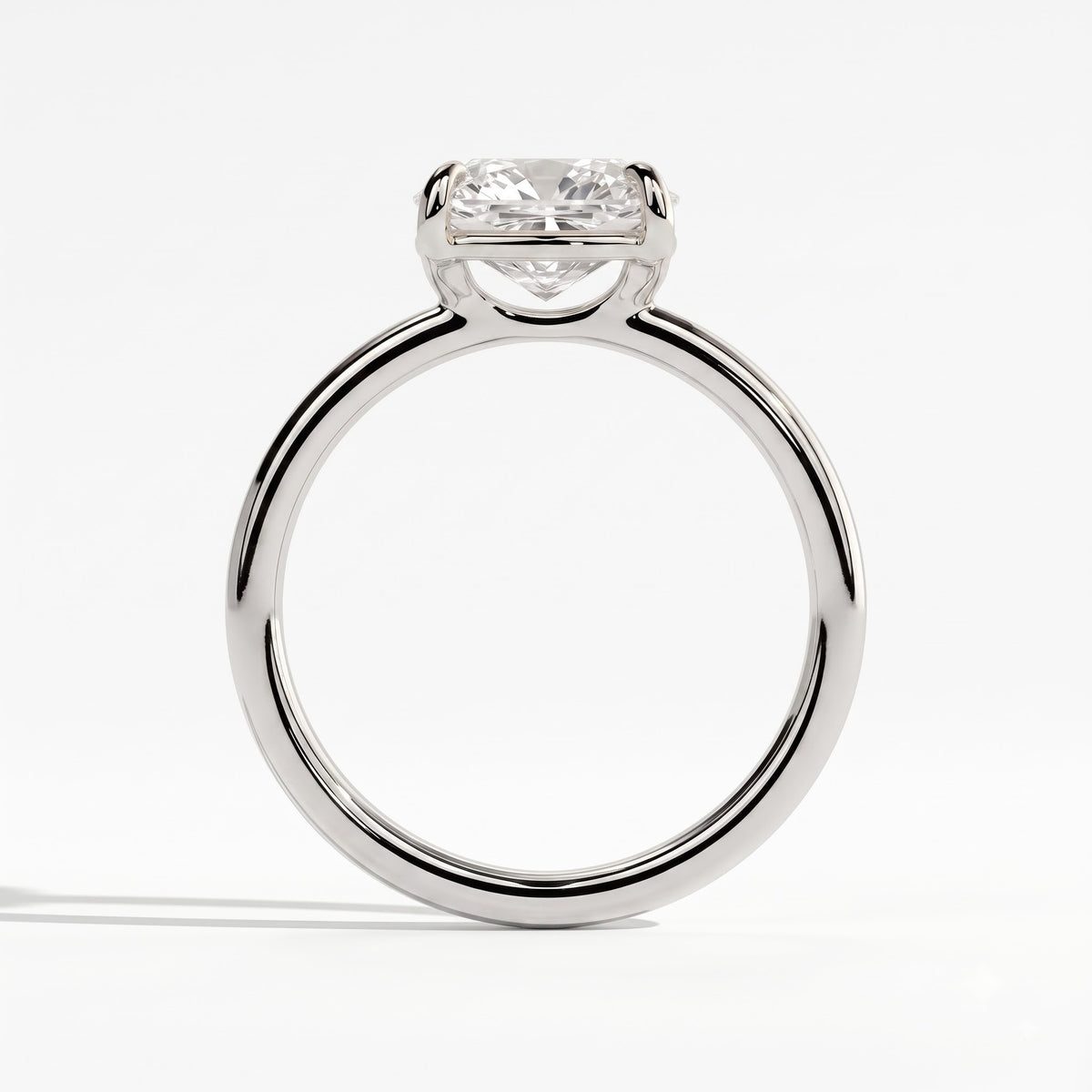 Elongated Cushion lab-grown diamond east-west solitaire engagement ring in 18K (750) white gold, side profile 