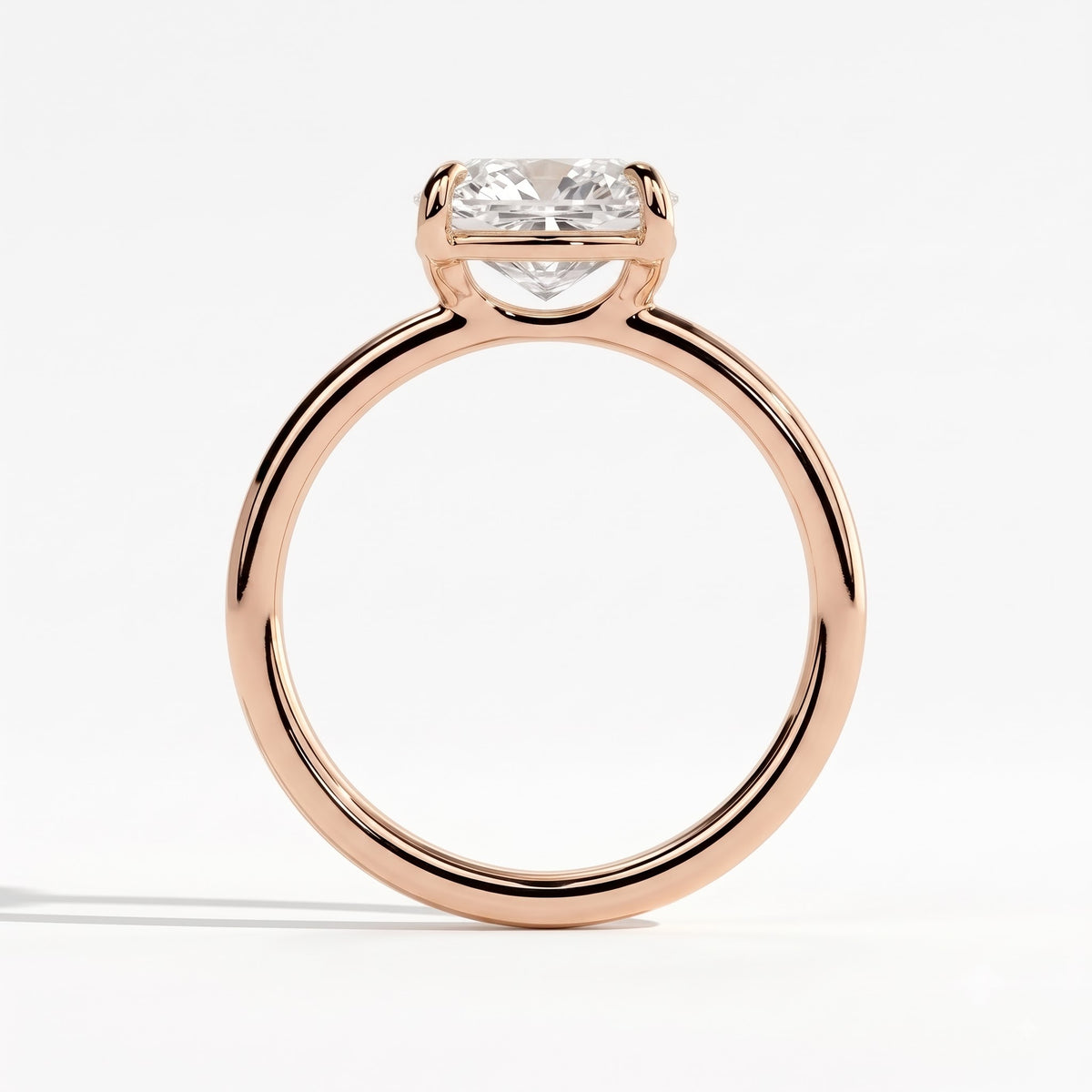 Elongated Cushion lab-grown diamond east-west solitaire engagement ring in 18K (750) rose gold, side profile 
