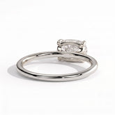 Elongated Cushion lab-grown diamond east-west solitaire engagement ring in 950 platinum, on white background 