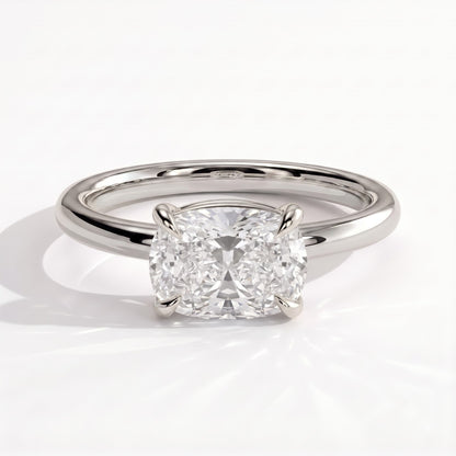 Elongated Cushion lab-grown diamond east-west solitaire engagement ring in 950 platinum, front view 