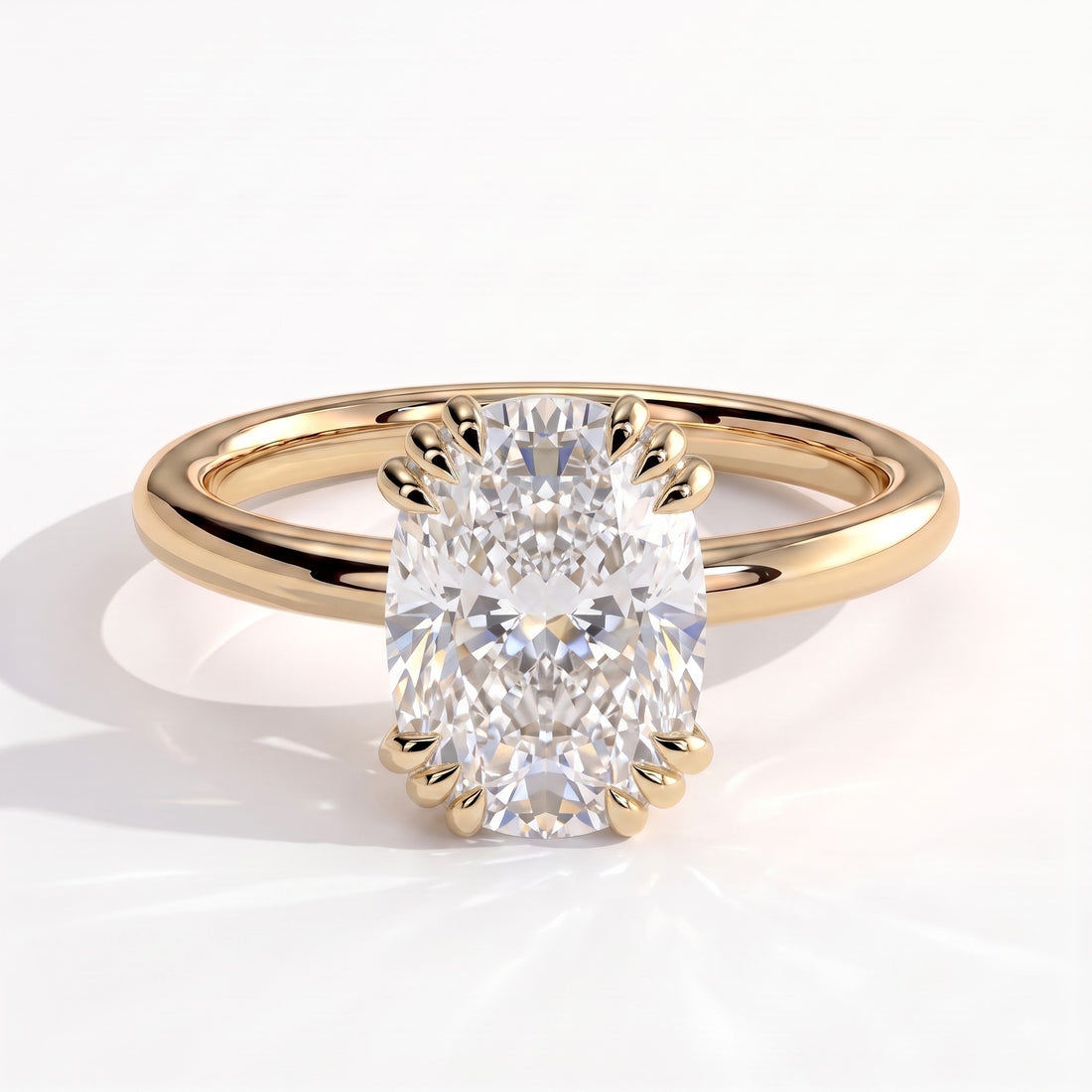 Elongated Cushion lab-grown diamond solitaire engagement ring in 14K (585) yellow gold, front view 