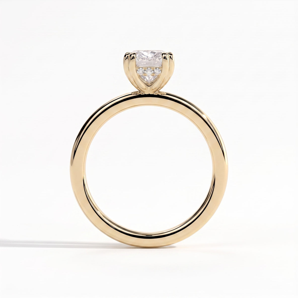 Elongated Cushion lab-grown diamond solitaire engagement ring in 14K (585) yellow gold, side profile 