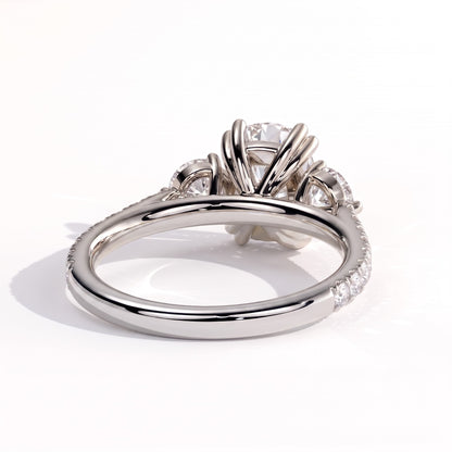 Elongated Cushion lab-grown diamond three-stone engagement ring in 14K (585) white gold, on white background 