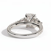 Elongated Cushion lab-grown diamond three-stone engagement ring in 14K (585) white gold, on white background 