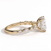 Elongated Cushion lab-grown diamond halo engagement ring in 14K (585) yellow gold, detail view 