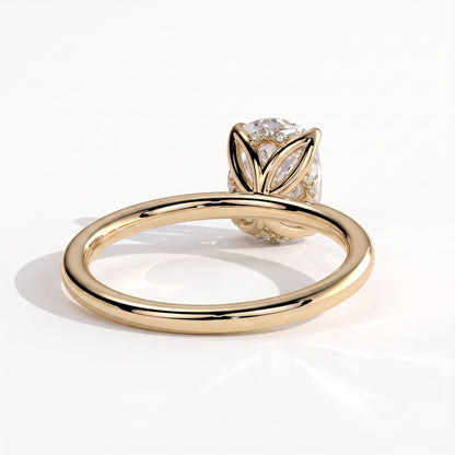 Elongated Cushion lab-grown diamond solitaire engagement ring in 18K (750) yellow gold, on white background 
