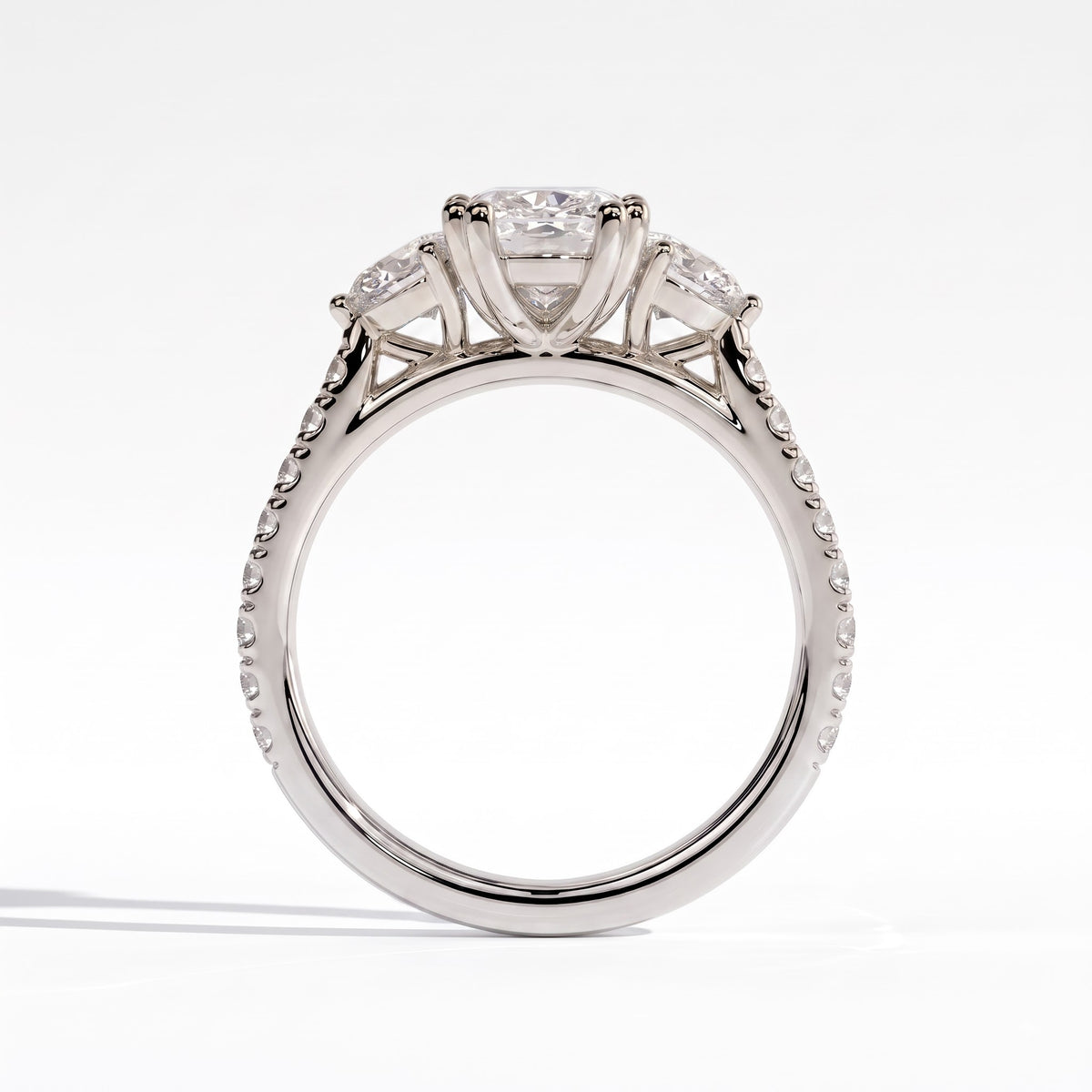 Elongated Cushion lab-grown diamond three-stone engagement ring in 18K (750) white gold, side profile 