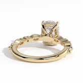 Elongated Cushion lab-grown diamond halo engagement ring in 18K (750) yellow gold, on white background 