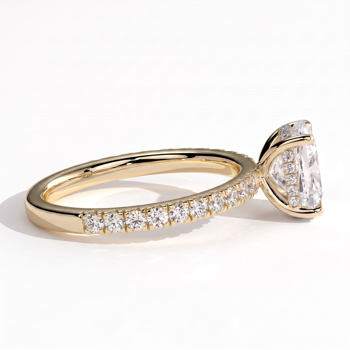 Elongated Cushion lab-grown diamond halo engagement ring in 18K (750) yellow gold, detail view 