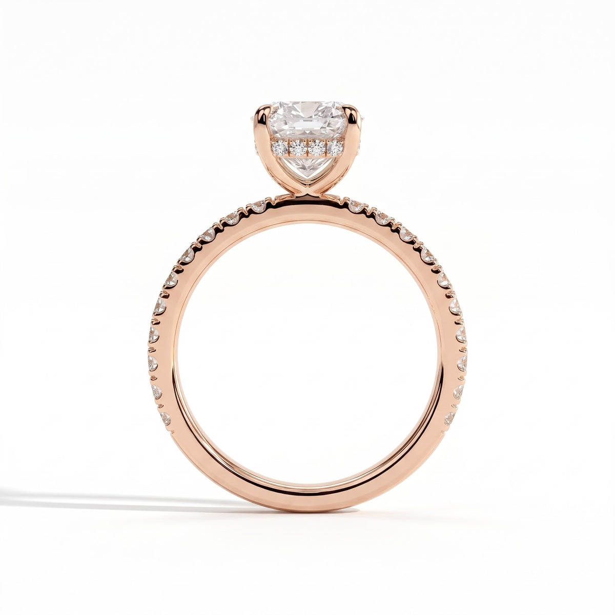 Elongated Cushion lab-grown diamond halo engagement ring in 18K (750) rose gold, side profile 