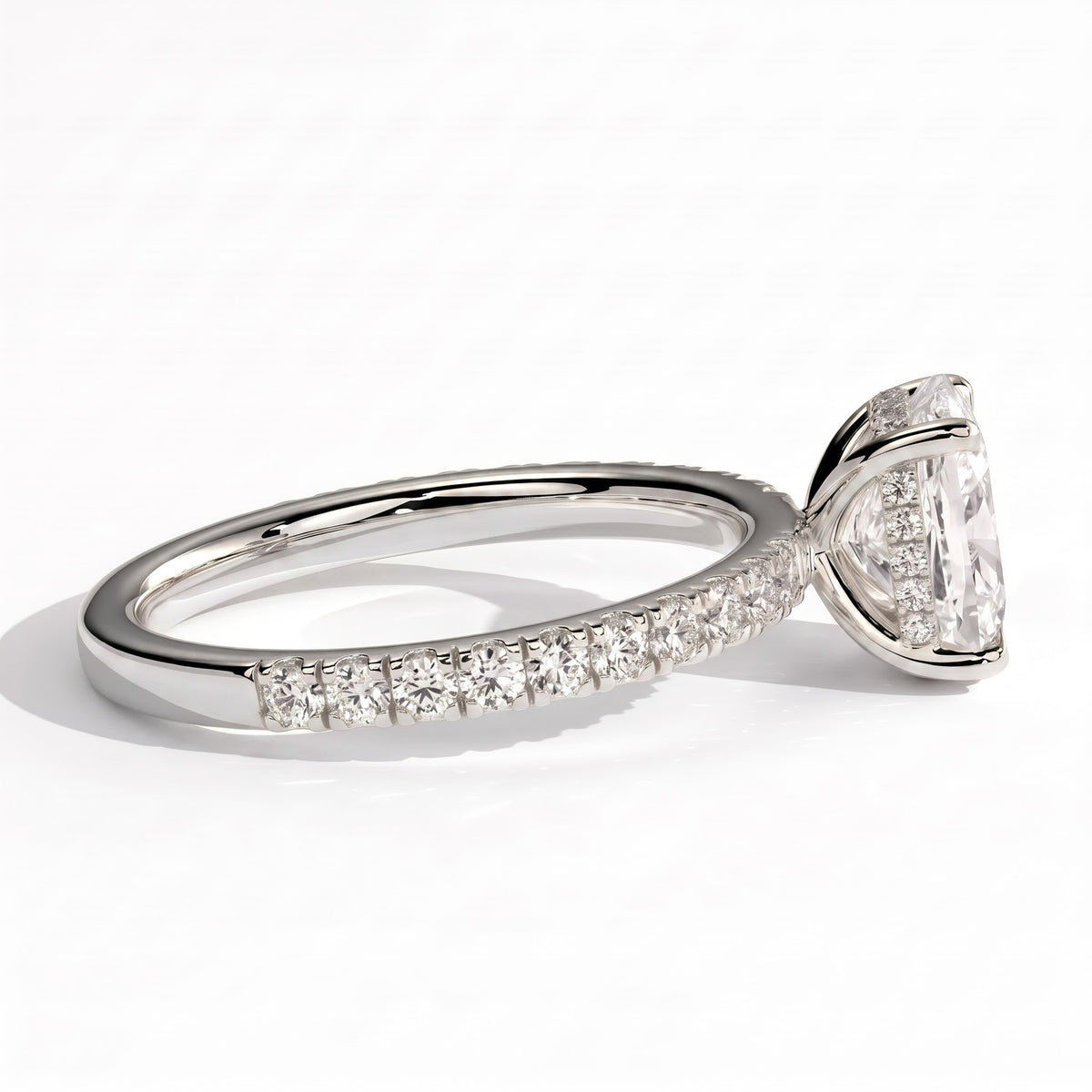 Elongated Cushion lab-grown diamond halo engagement ring in 18K (750) white gold, detail view 