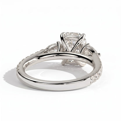 Elongated Cushion lab-grown diamond three-stone engagement ring in 950 platinum, on white background 