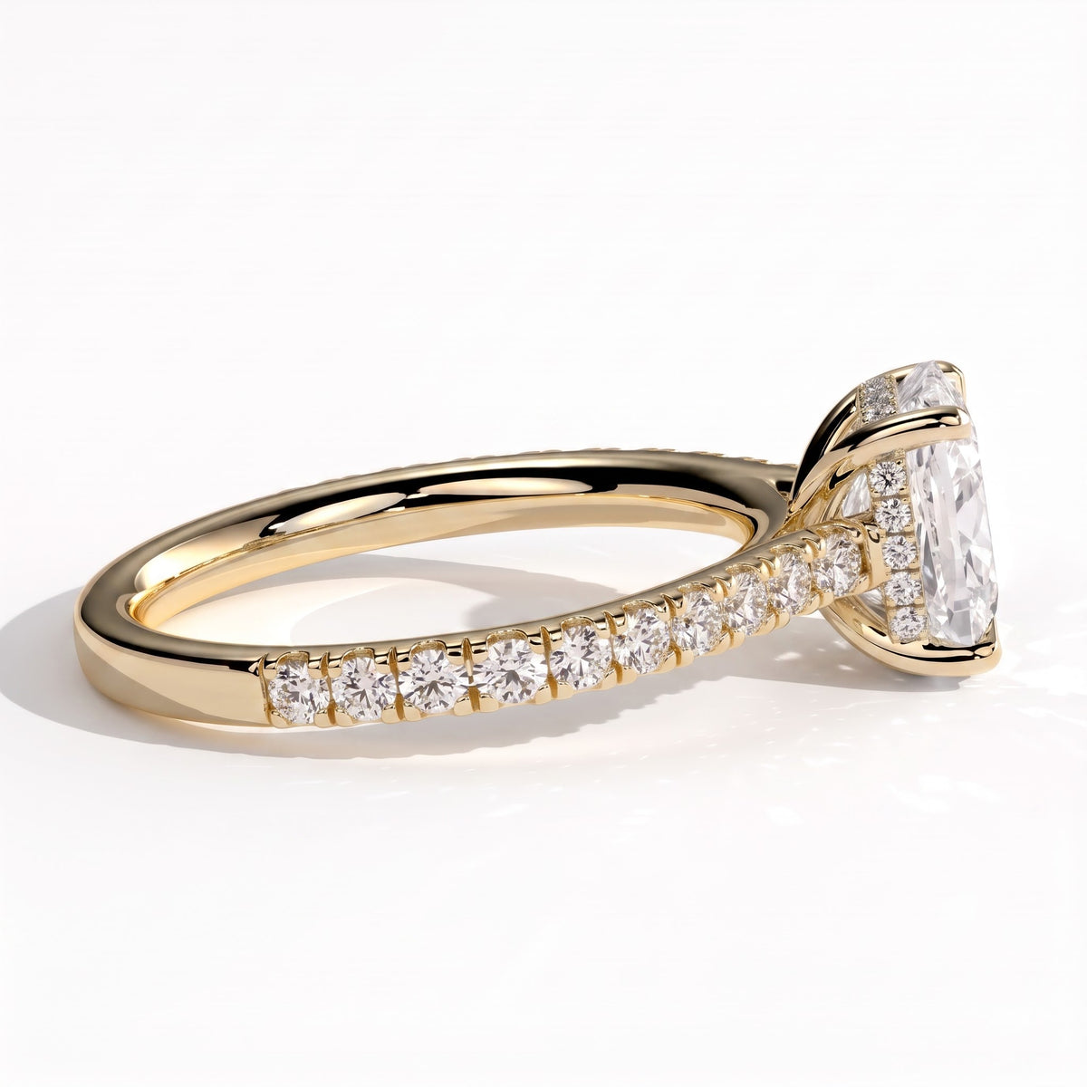 Elongated Cushion lab-grown diamond halo engagement ring in 14K (585) yellow gold, detail view 