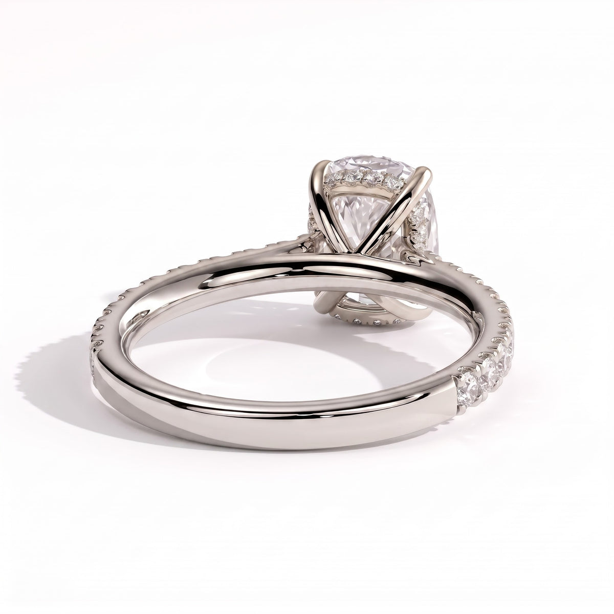 Elongated Cushion lab-grown diamond halo engagement ring in 14K (585) white gold, on white background 
