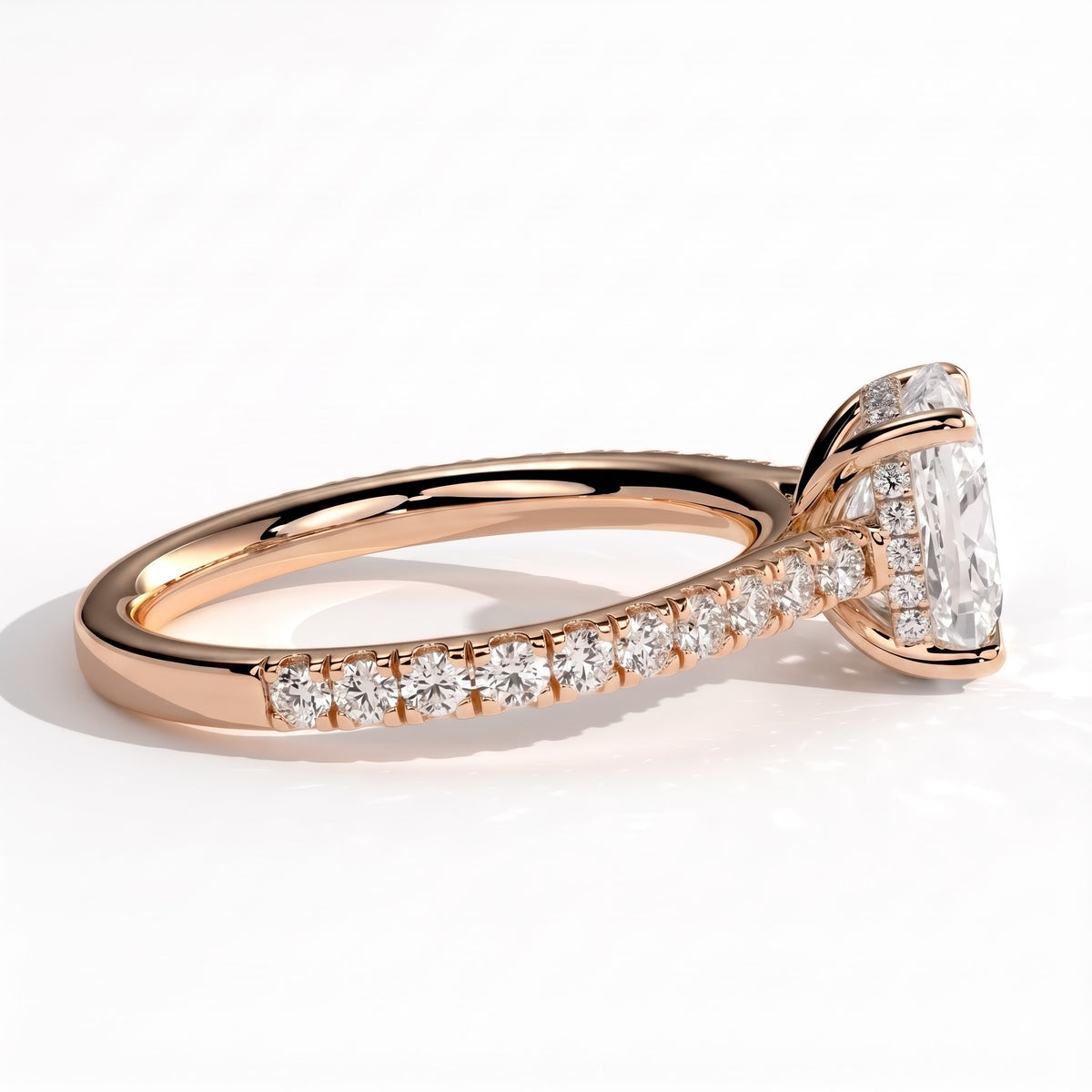 Elongated Cushion lab-grown diamond halo engagement ring in 14K (585) rose gold, detail view 