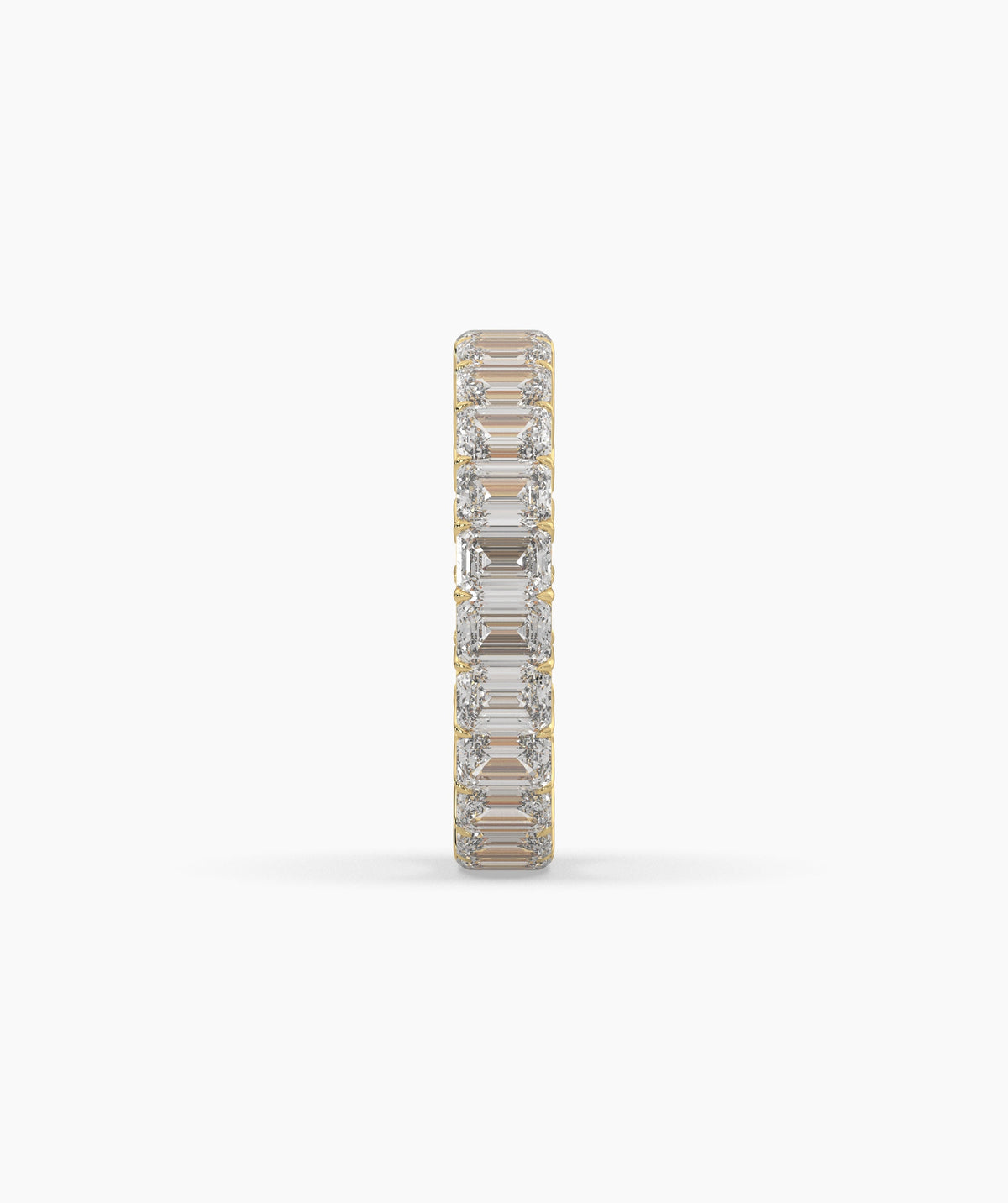 Joline emerald-cut lab-grown diamond eternity ring in 750 yellow gold, side profile view 