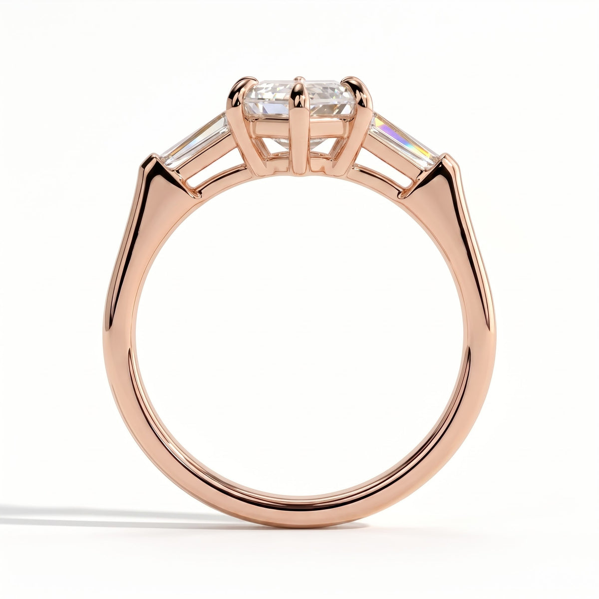 Elongated Hexagon lab-grown diamond three-stone engagement ring in 14K (585) rose gold, side profile 