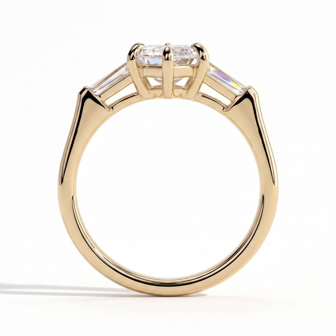 Elongated Hexagon lab-grown diamond three-stone engagement ring in 14K (585) yellow gold, side profile 