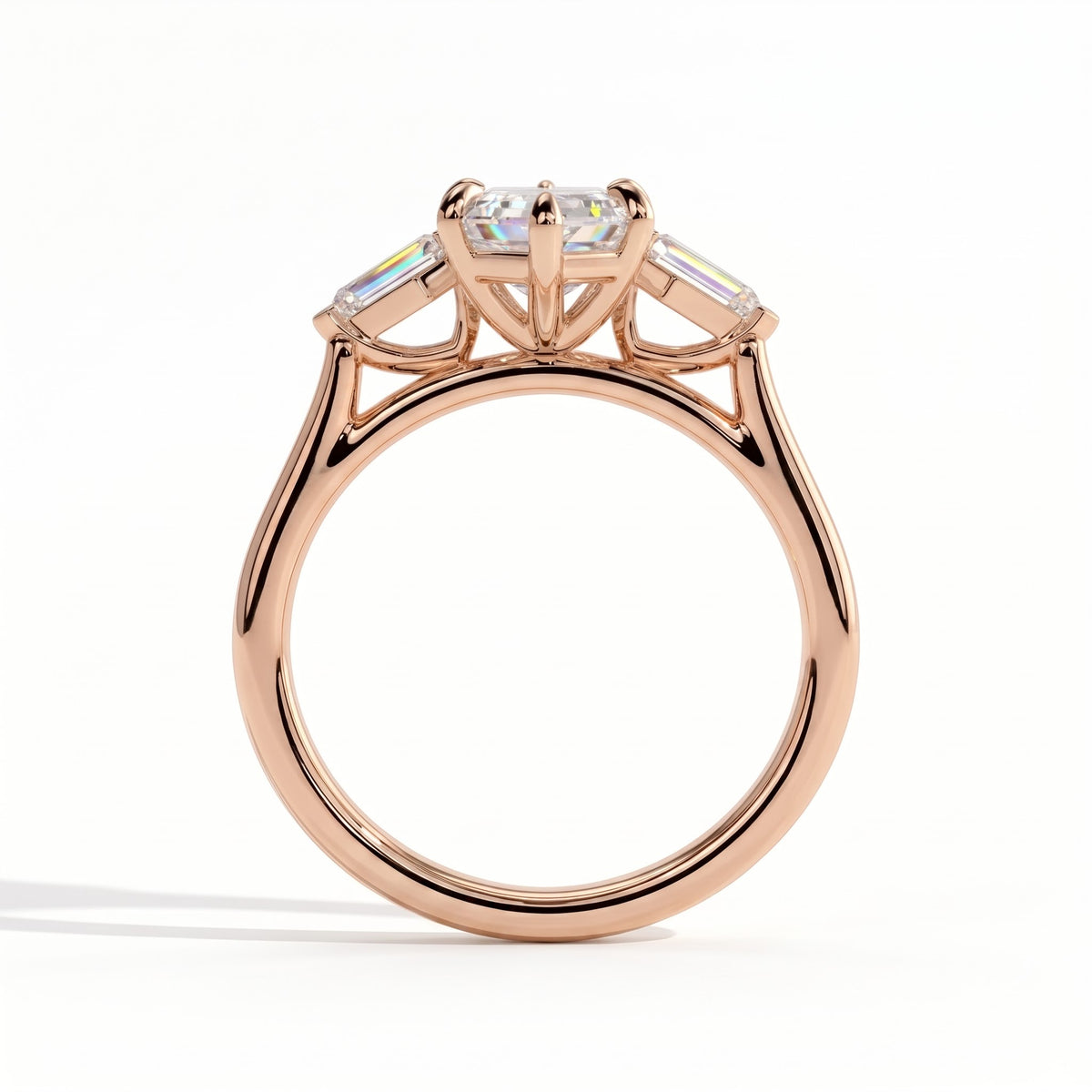 Elongated Hexagon lab-grown diamond three-stone engagement ring in 14K (585) rose gold, side profile 